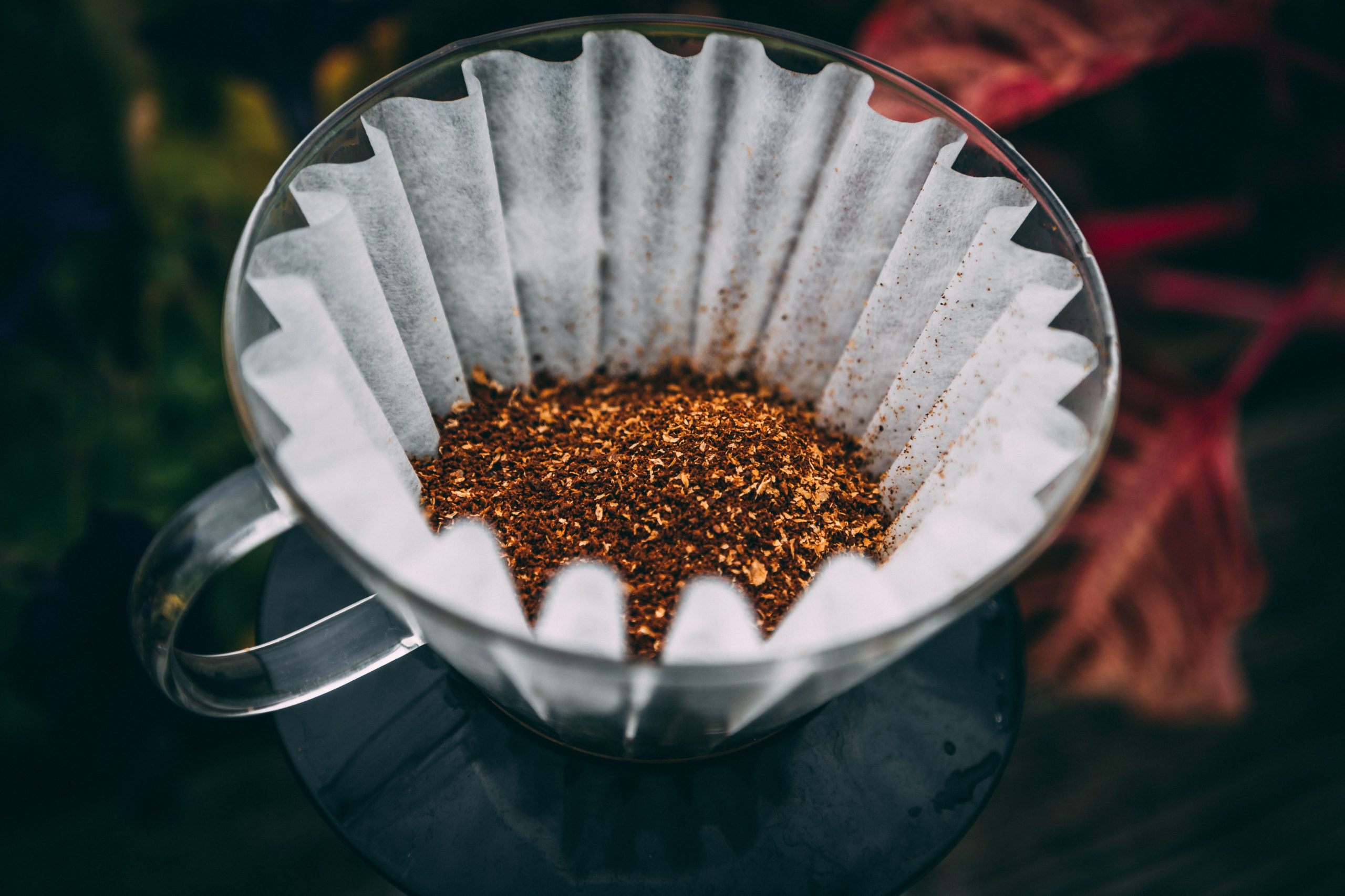 coarse ground coffee in a coffee filter drip cup
